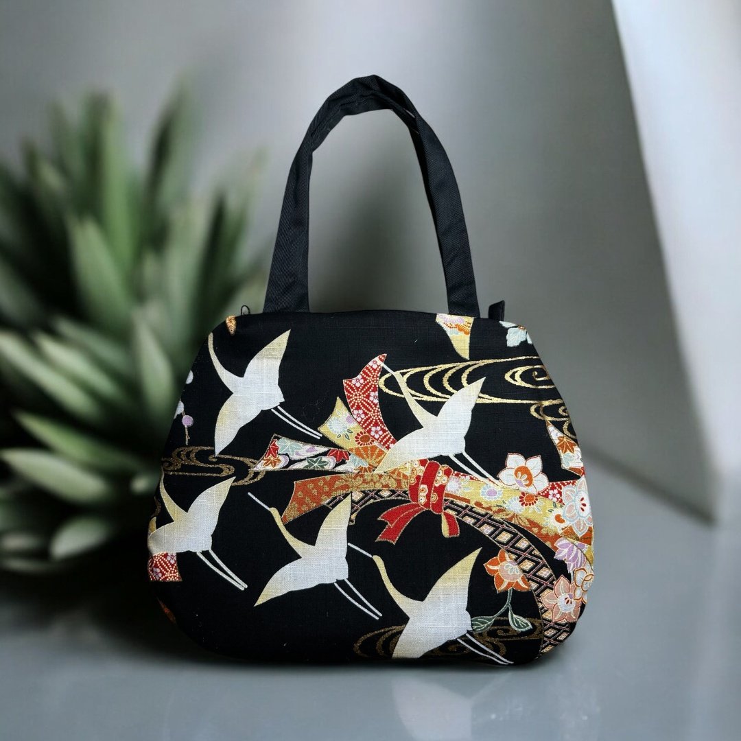 Dento Tasche Fliegende Kräne