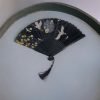 Leque japonês preto com grou