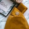 SAC À NŒUDS EN VELOURS DORÉ